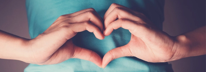Chiropractic Toronto ON Heart Hands Person holding their hands in a heart shape.